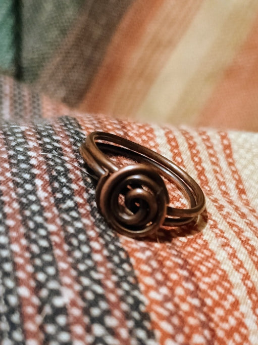 Handmade copper spiral ring with natural patina