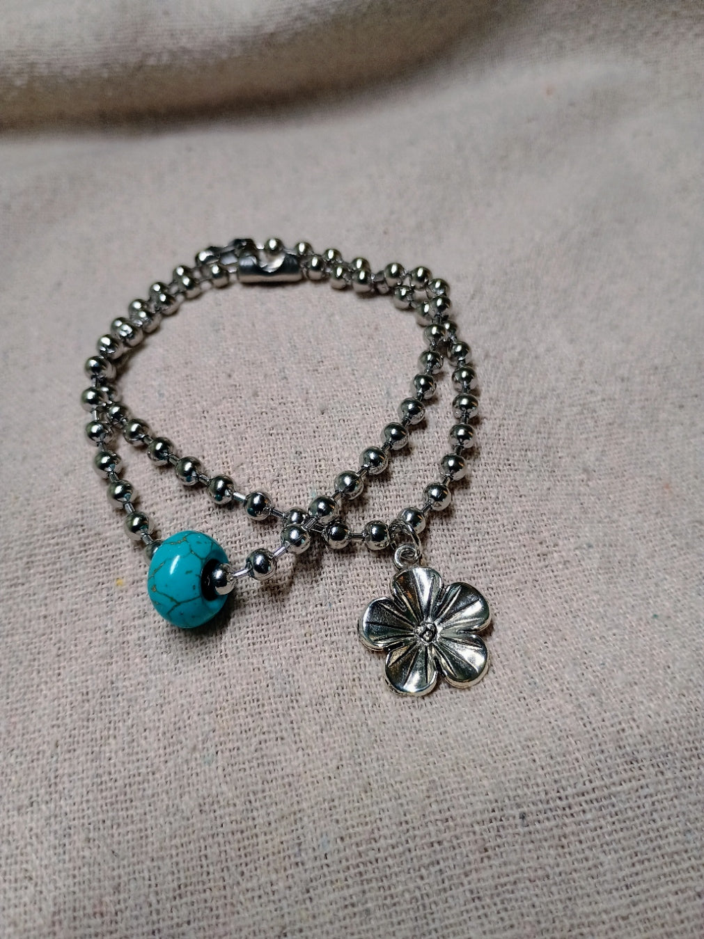 4 mm silver-tone ball-chain bracelet set with turquoise-colored bead and flower charm