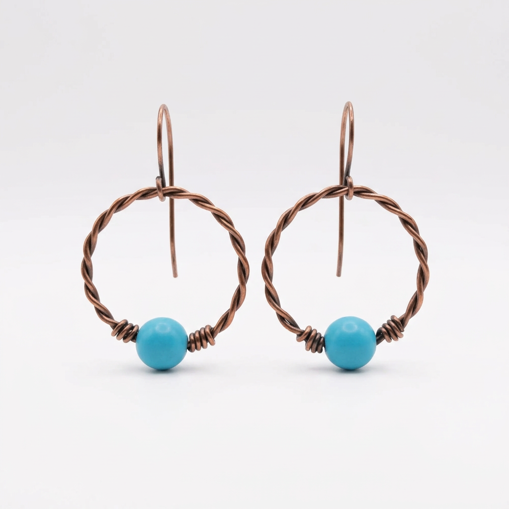 Copper twist hoop earrings with turquoise-blue beads on a white background