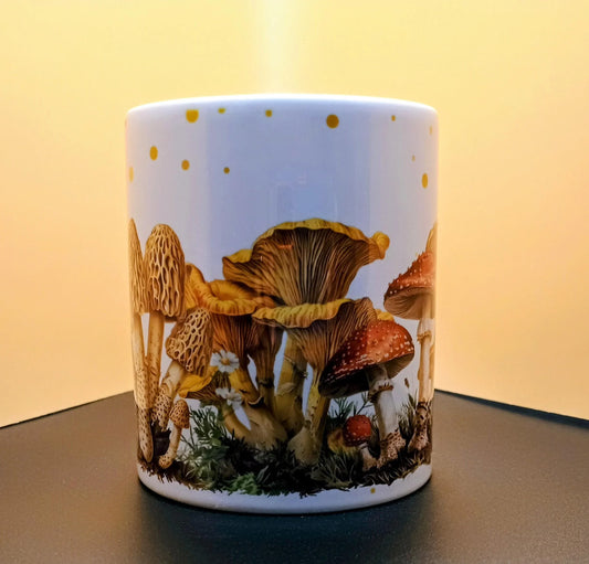 White ceramic mug with detailed illustration of various mushrooms and foliage on black table