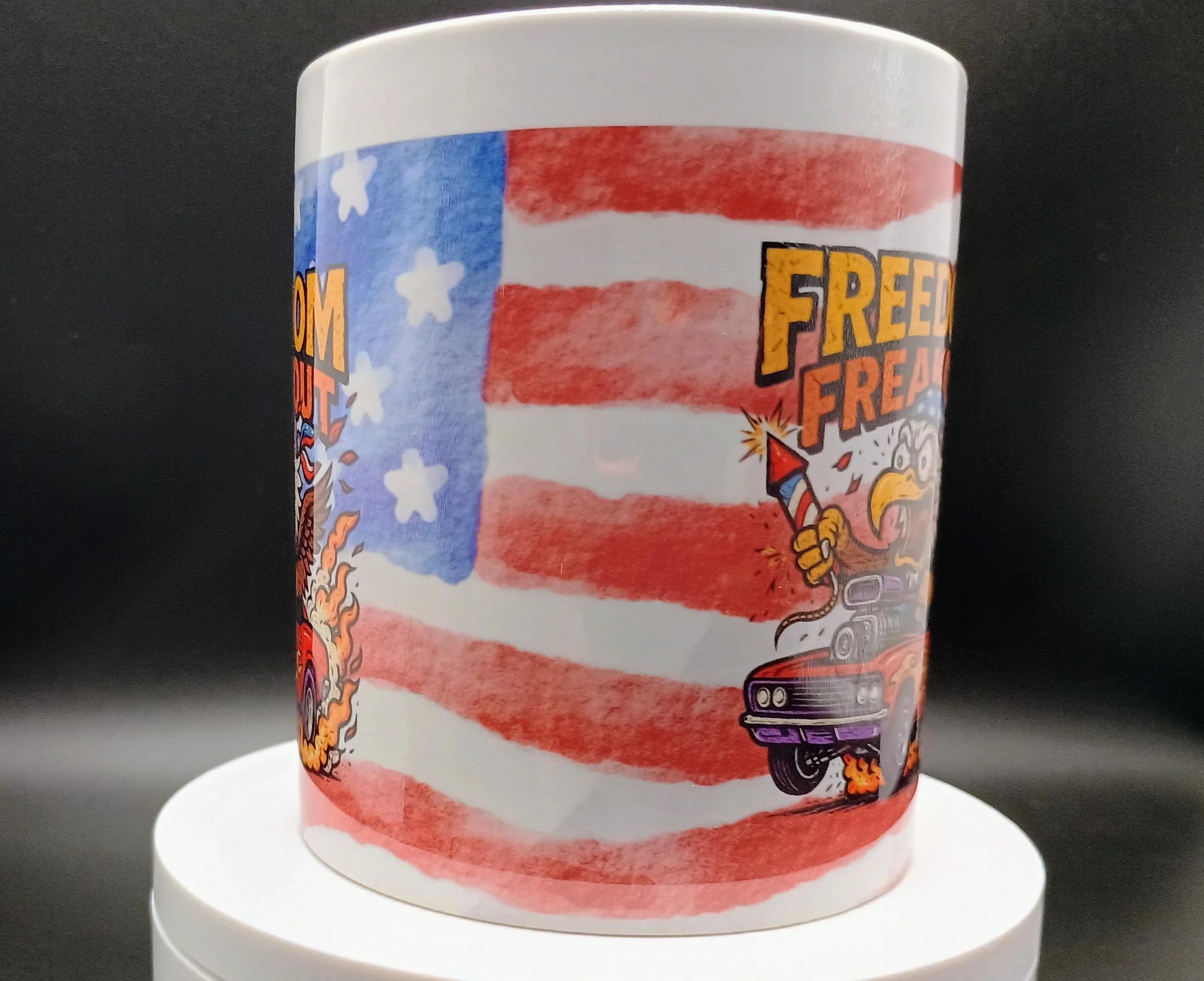 Ceramic mug with American flag background and cartoon eagle holding rocket with muscle car in flames