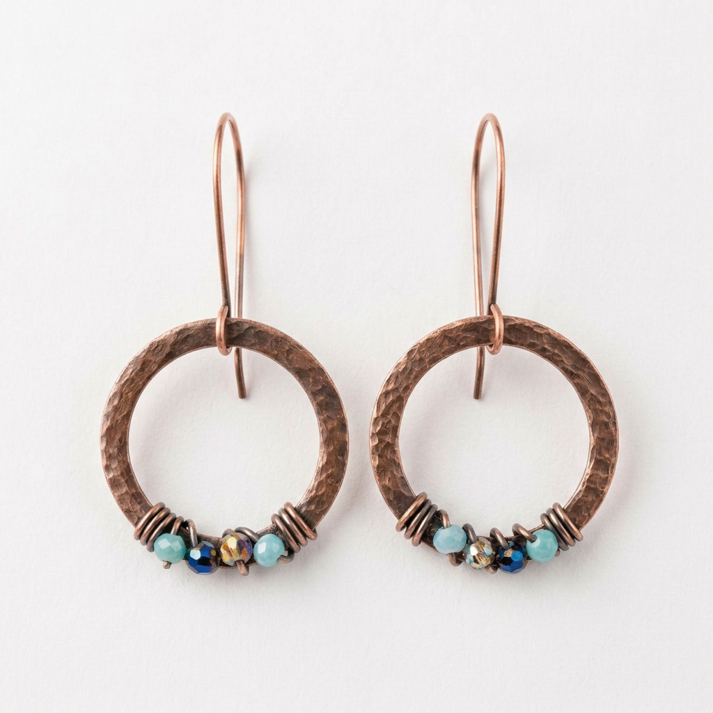Hammered copper hoop earrings with copper ear hooks and glass beads