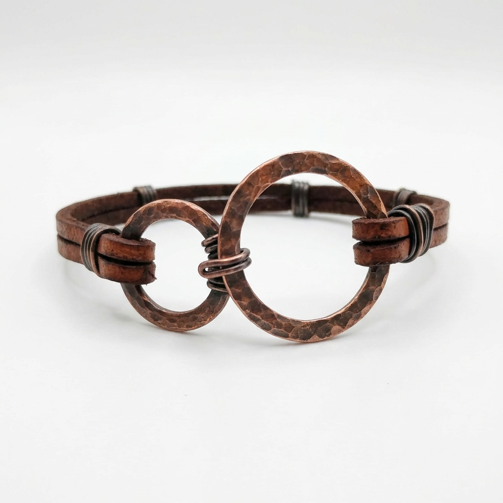 Leather bracelet with matching oxidized copper rings