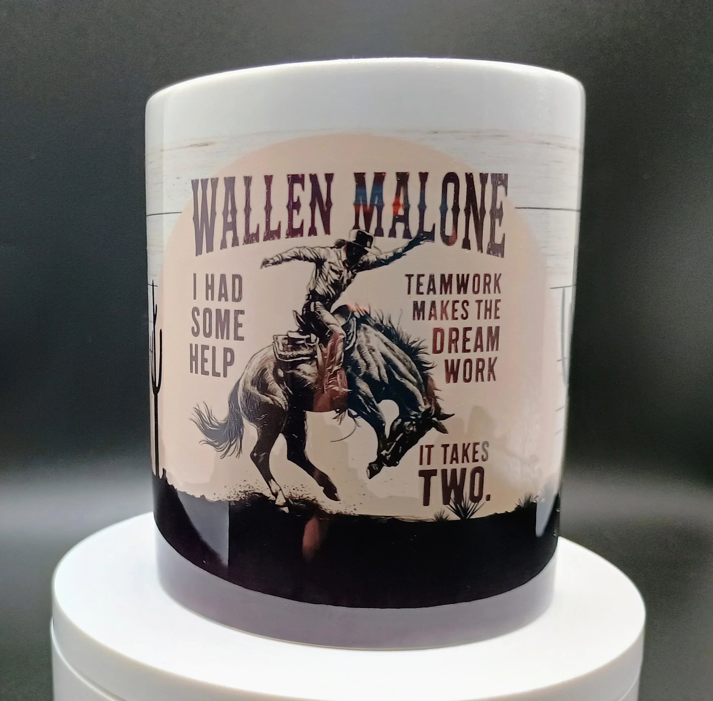White mug featuring cowboy on bucking horse, text "Wallen Malone" and inspirational teamwork quote