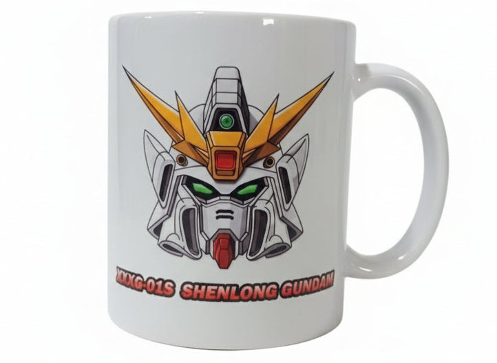 White ceramic mug featuring colorful Yong-01S Shenlong Gundam head graphic with green eyes and yellow accents